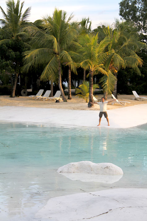 Dondi standing at the edge of a pool at Plantation Bay in Cebu