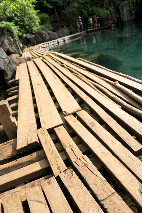 Rustic planks along Kayangan Lake