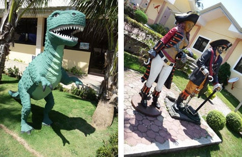T-rex and pirate statues at Hannah's Beach Resort & Convention Center