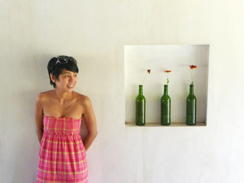 Ren posing with the bottles at Kapuluan Vista Resort