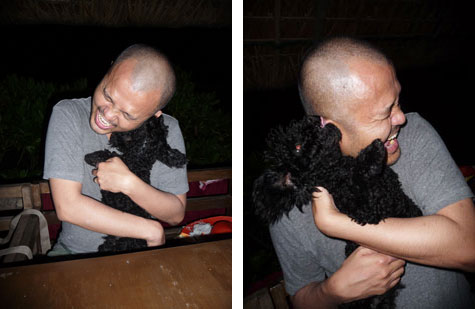 JB playing with a dog at Kapuluan Vista Resort