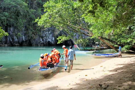 Tourists aboard a boat in Puerto Princesa