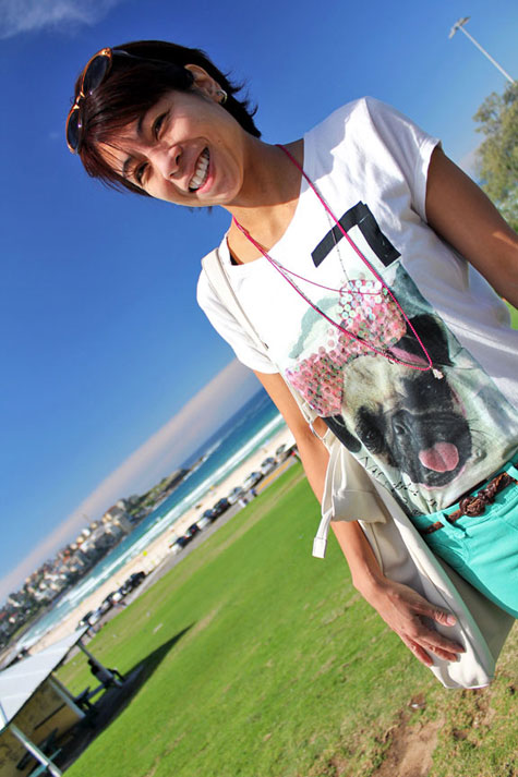 Photo of beautiful tourist on Bondi Beach, Sydney, Australia