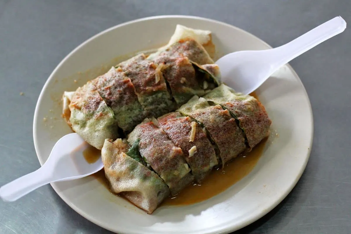 What to Eat in Penang, Malaysia Popiah at a stall in Medan Selera Padang Brown