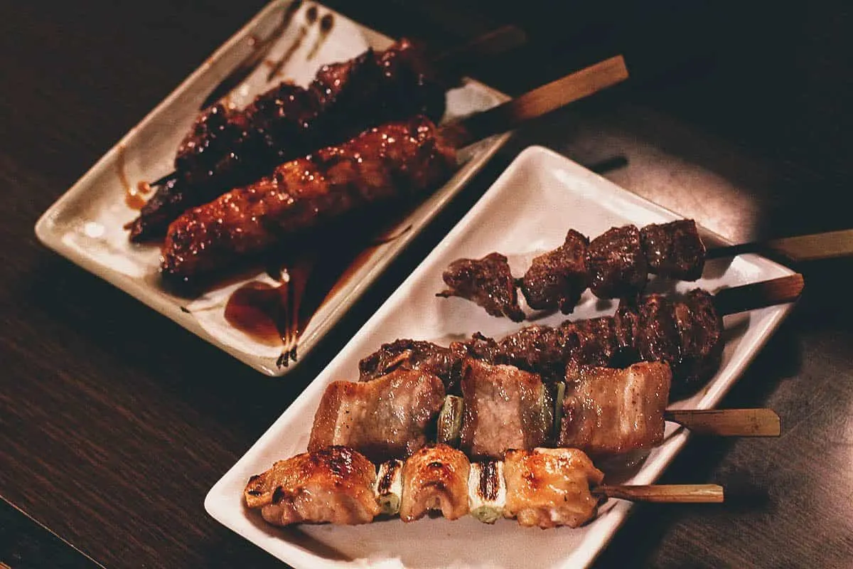 Plate of yakitori or skewered grilled chicken, a popular food at Japanese bars or izakayas