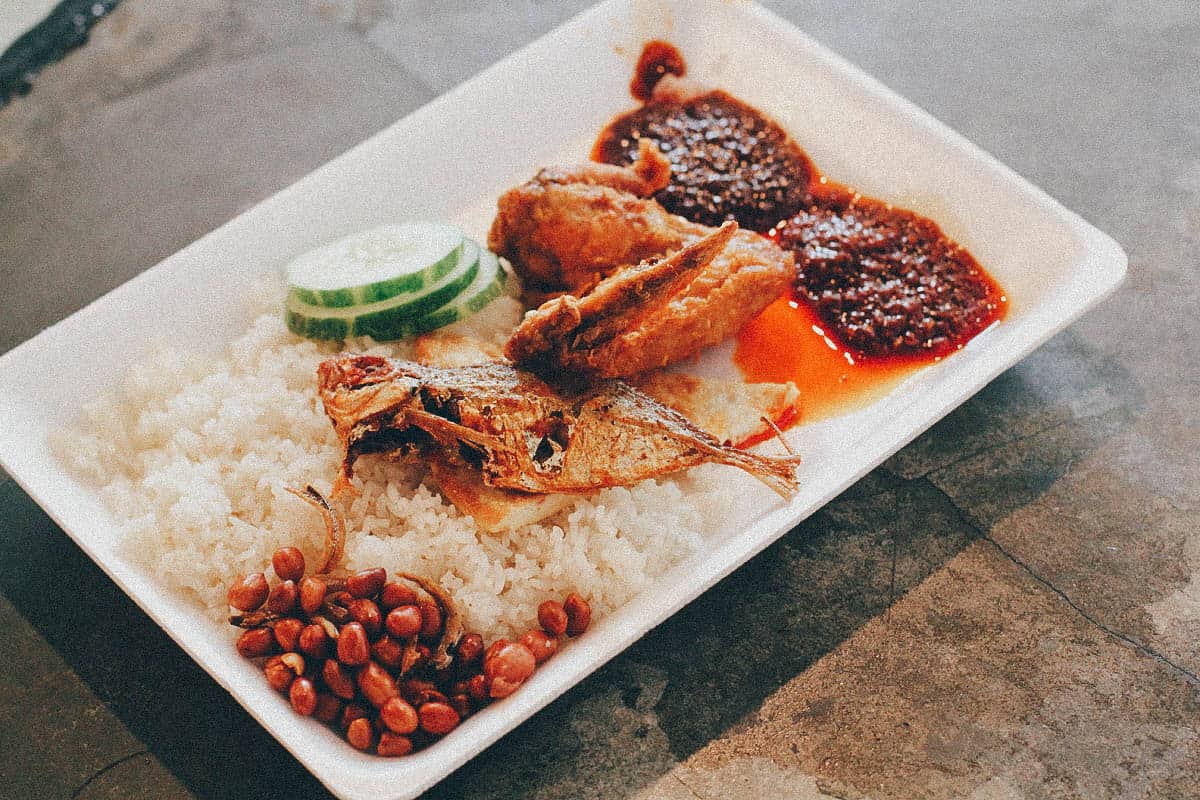 Plate of nasi lemak, a fragrant rice dish cooked in coconut milk and pandan leaf