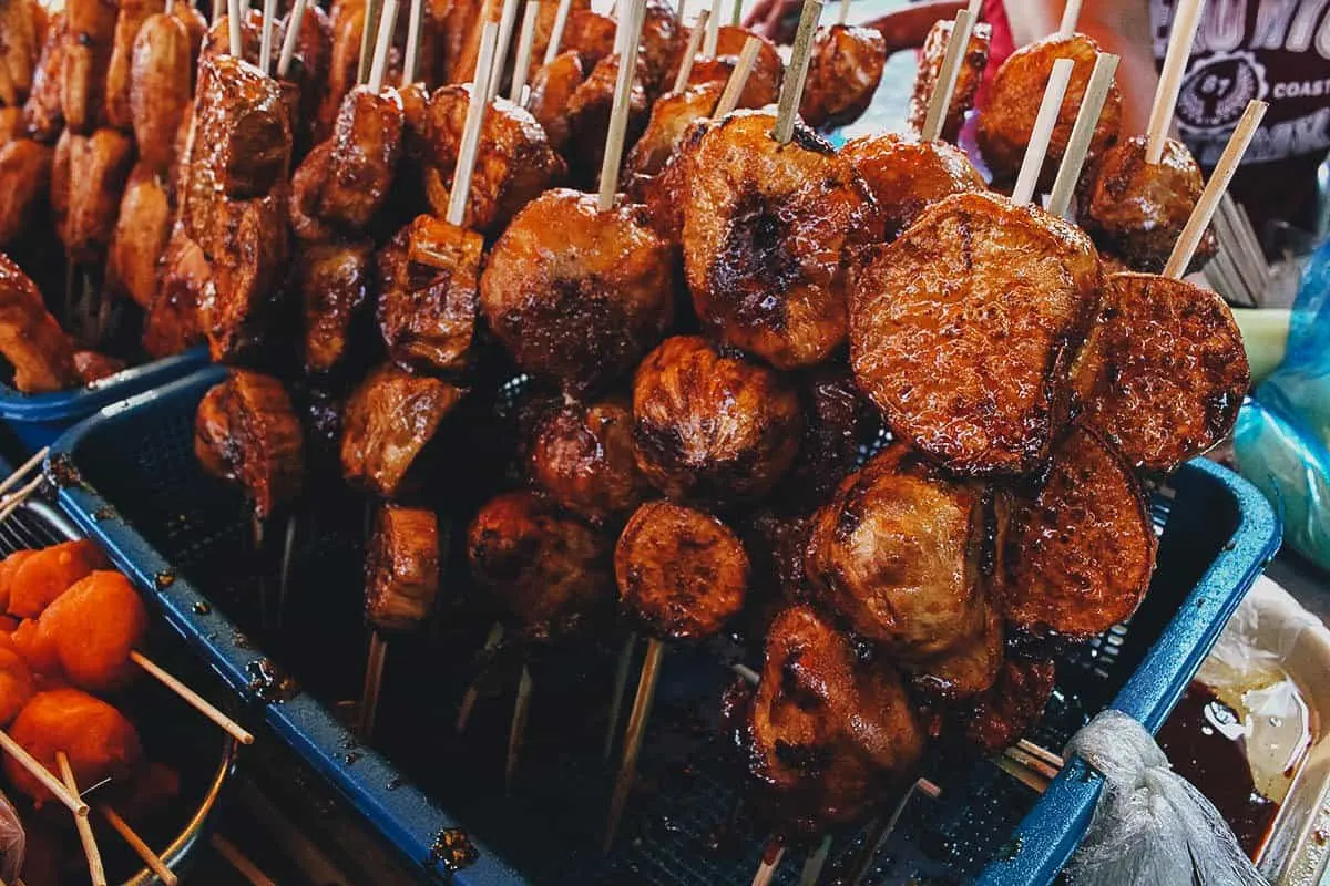 Sticks of kamote cue, deep-fried sweet potato skewers