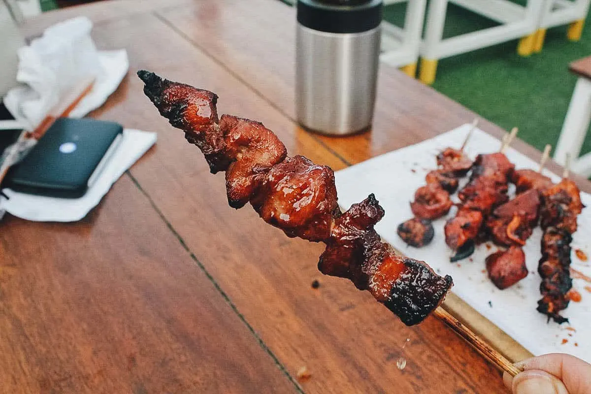 Filipino Food Guide Pork barbecue, one of the most famous Filipino street food dishes