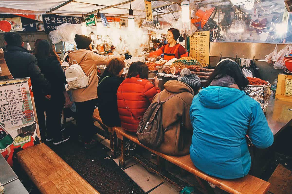 Diners at Gwangjang Market in Seoul, South Korea