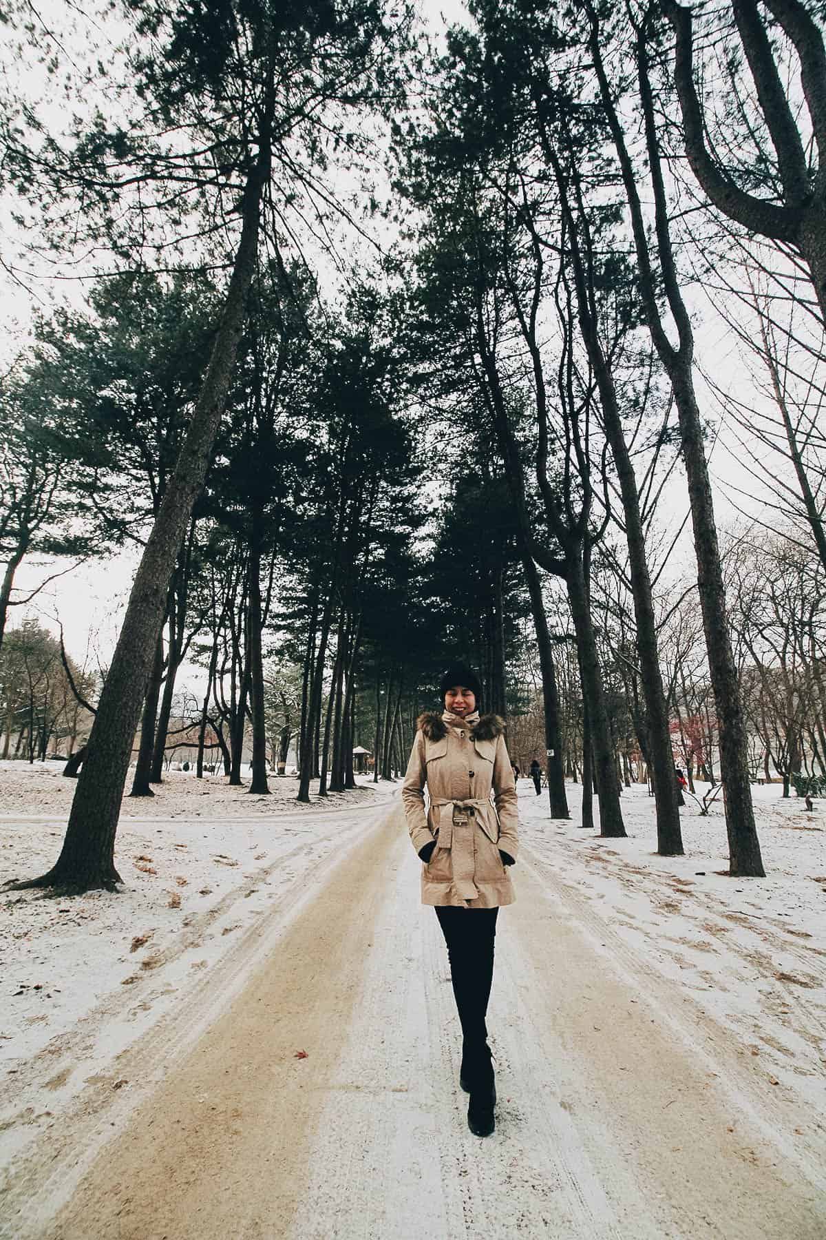 Ren posing on Riverside Walking Course on Nami Island in South Korea