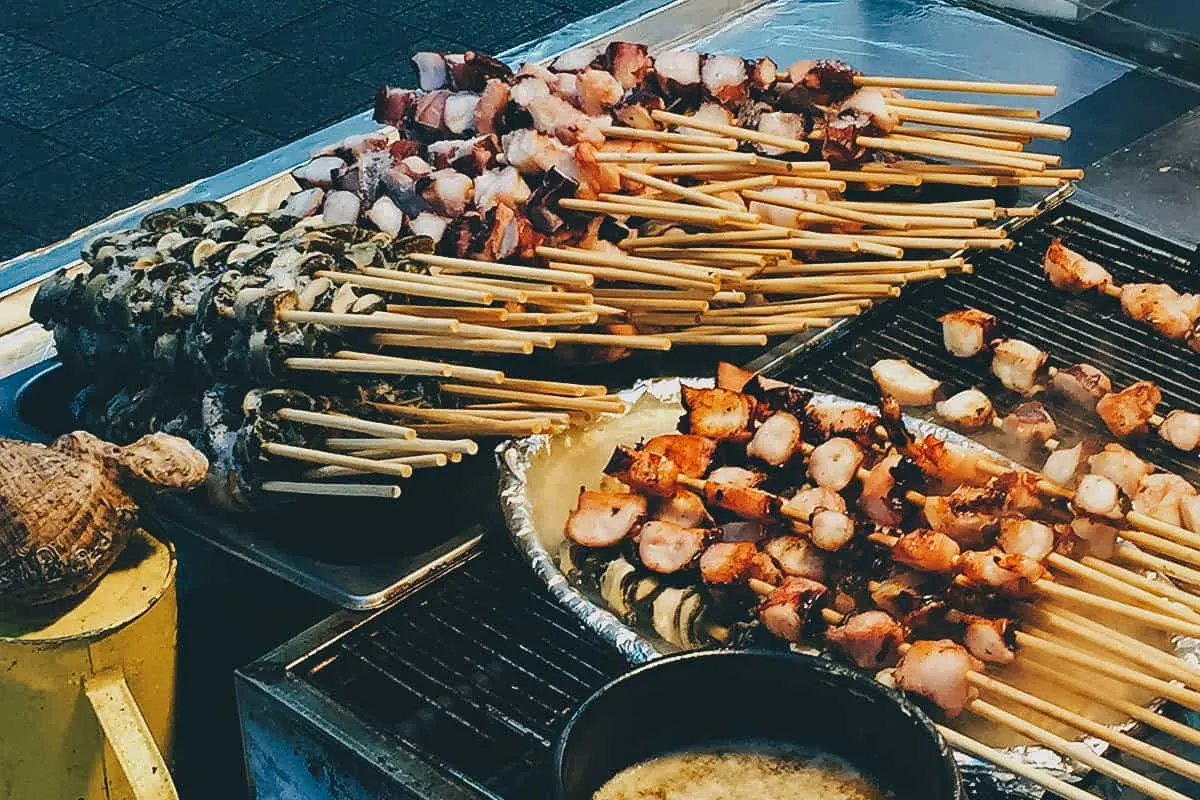 Things to Eat in South Korea Steamed octopus and conch skewers from street vendors