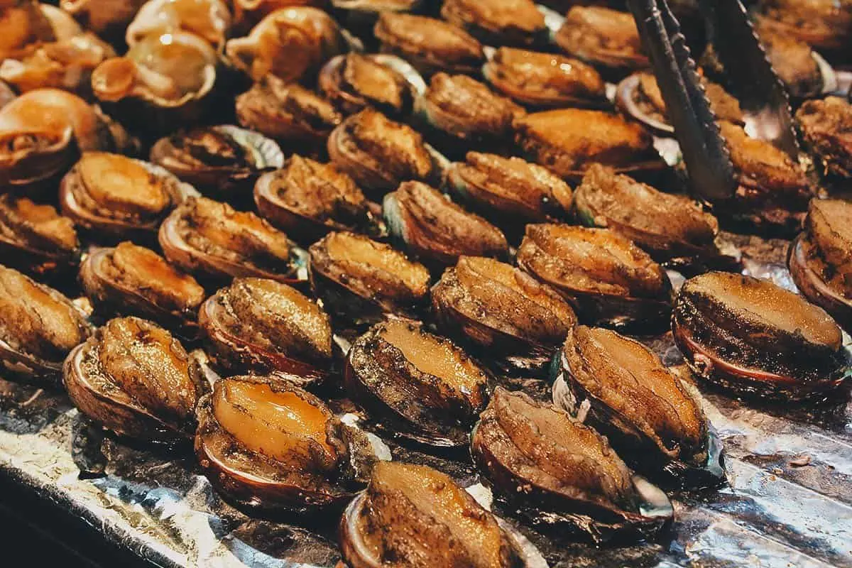 Grilled abalone at Fengjia Night Market in Taichung, Taiwan
