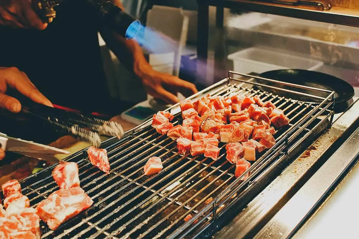 Flame-torched beef at Raohe Night Market in Taipei, Taiwan