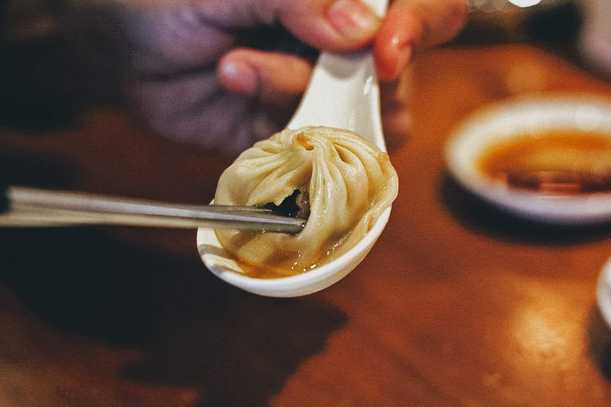 Piercing the skin of xiao long bao