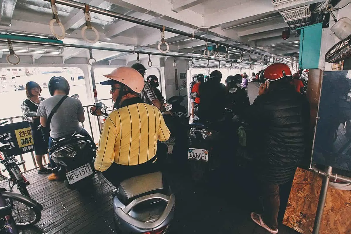 Cijin Island, Kaohsiung, Taiwan Motorcyclists onboard a ferry to Cijin Island in Kaohsiung, Taiwan