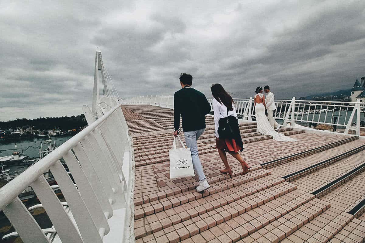 Walking on Lover's Bridge in Tamsui, New Taipei City, Taiwan