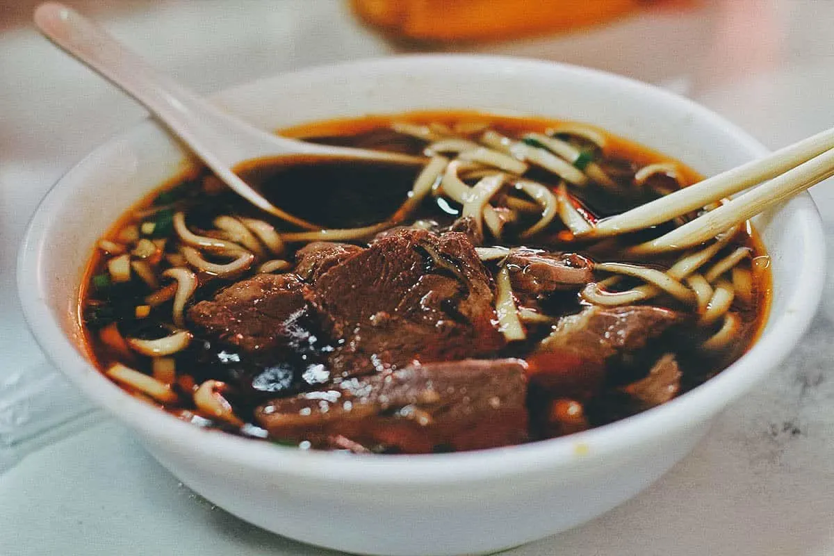 Bowl of braised beef noodle soup at Tao-Yuan Street Beef Noodle Shop in Taipei, Taiwan