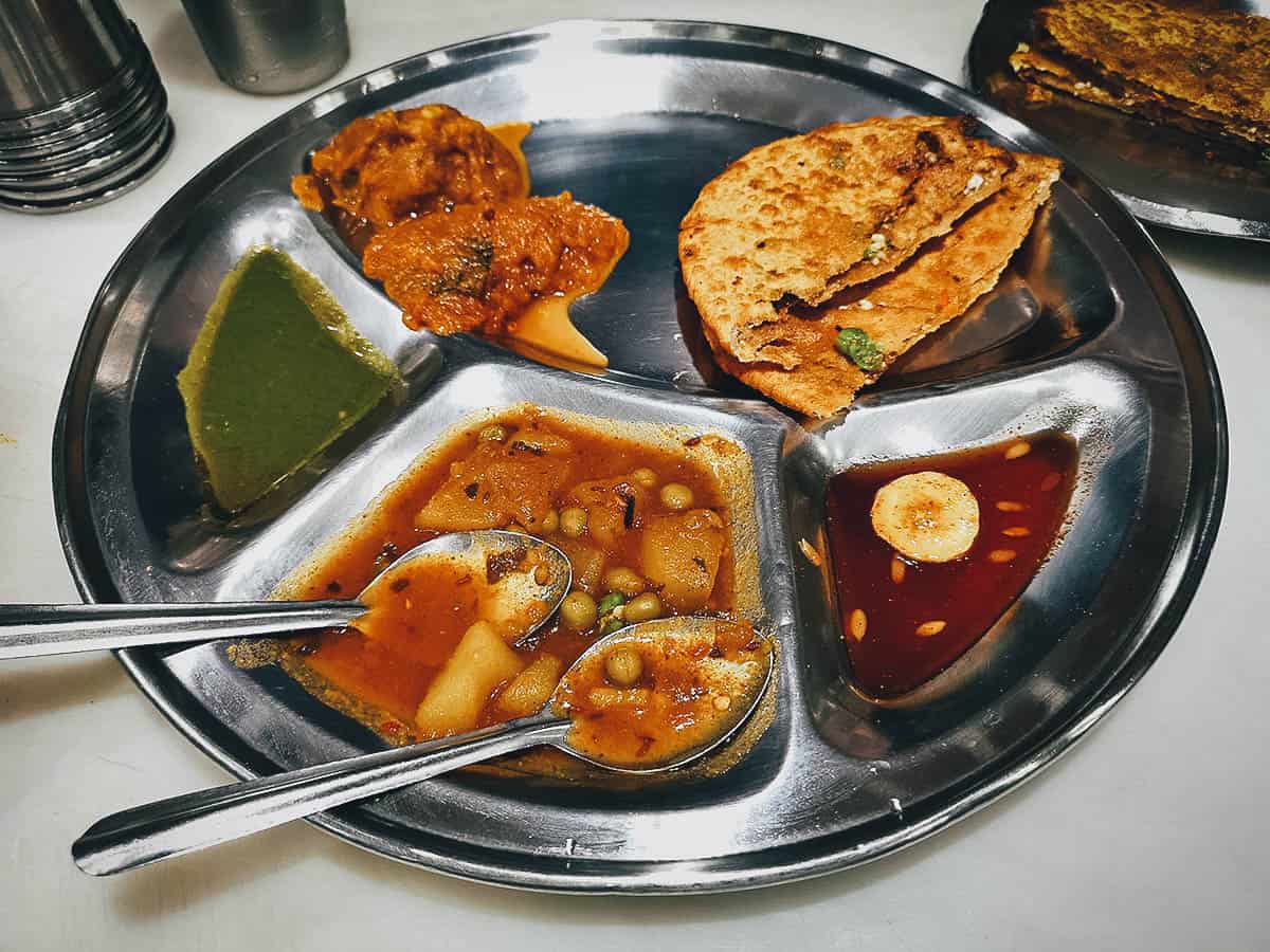 Paratha thali, one of the most popular street food dishes in India