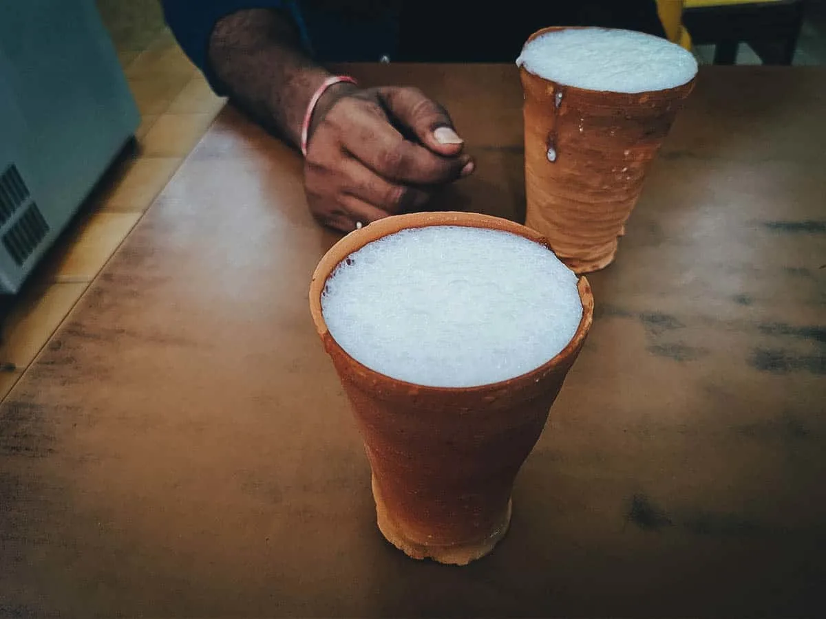 Lassi in clay pots at an Indian street food stall in Delhi