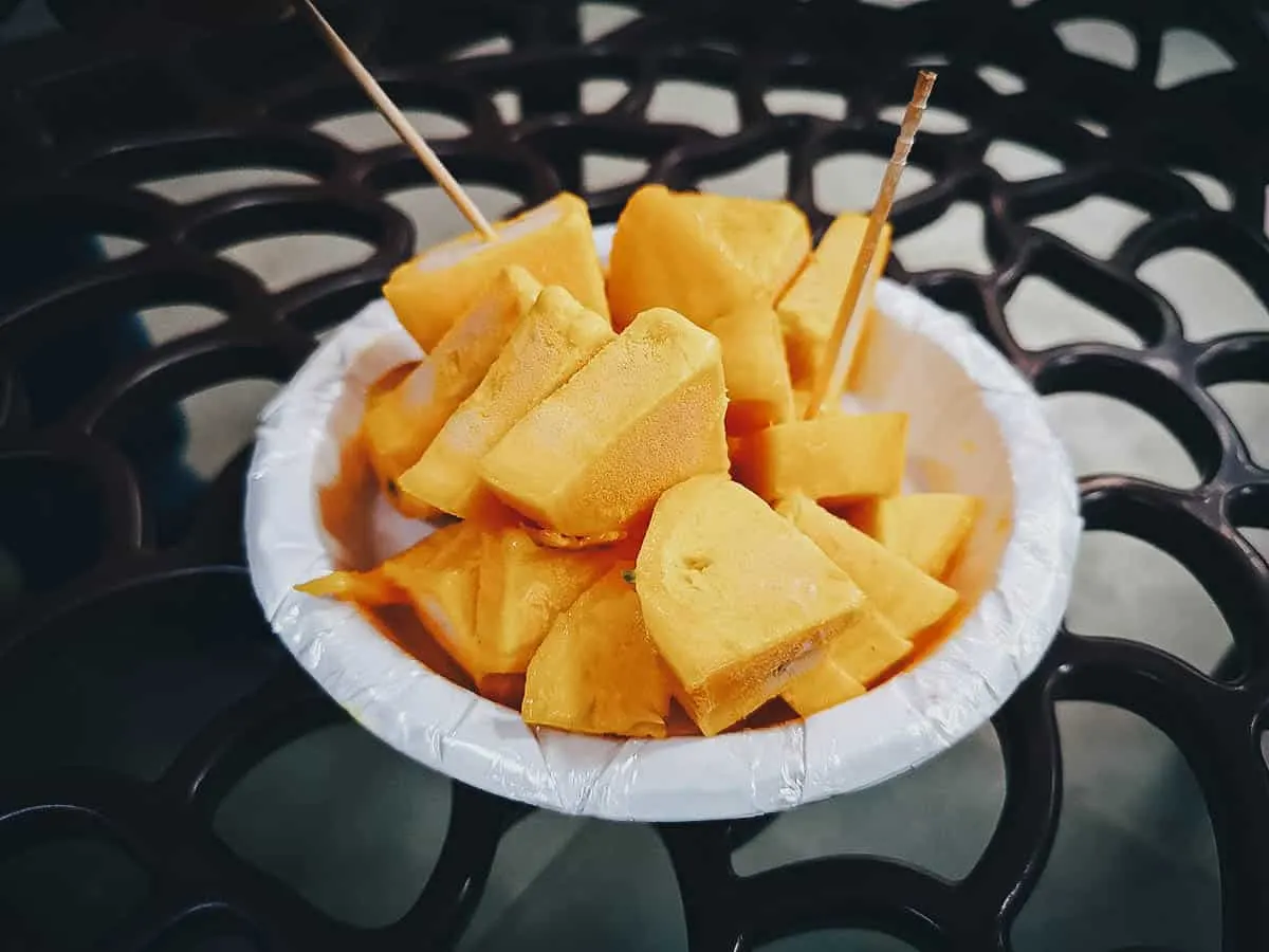 Indian Street Food Slices of mango kulfi, a popular ice cream in India