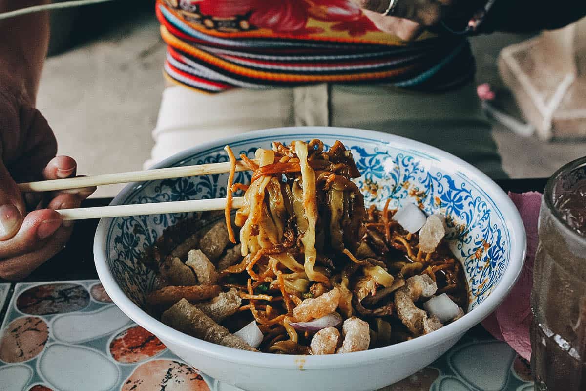 Bowl of khao soi at Khao Soi Khun Yai restaurant in Chiang Mai