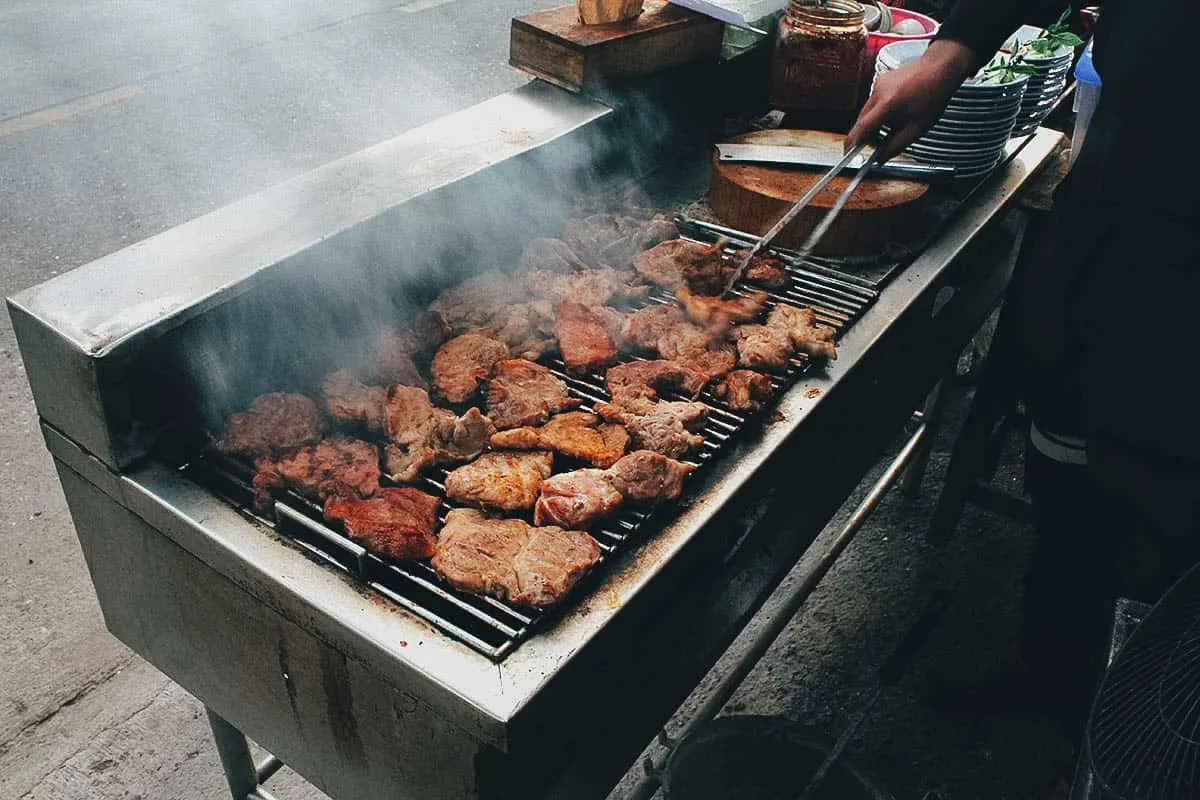 Meat grilling at Tong Tem Toh restaurant in Chiang Mai