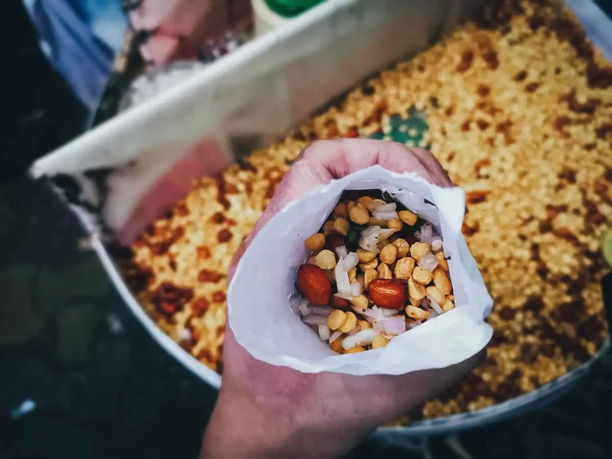 Chana dal chaat in a small bag, one of the most common street foods in India