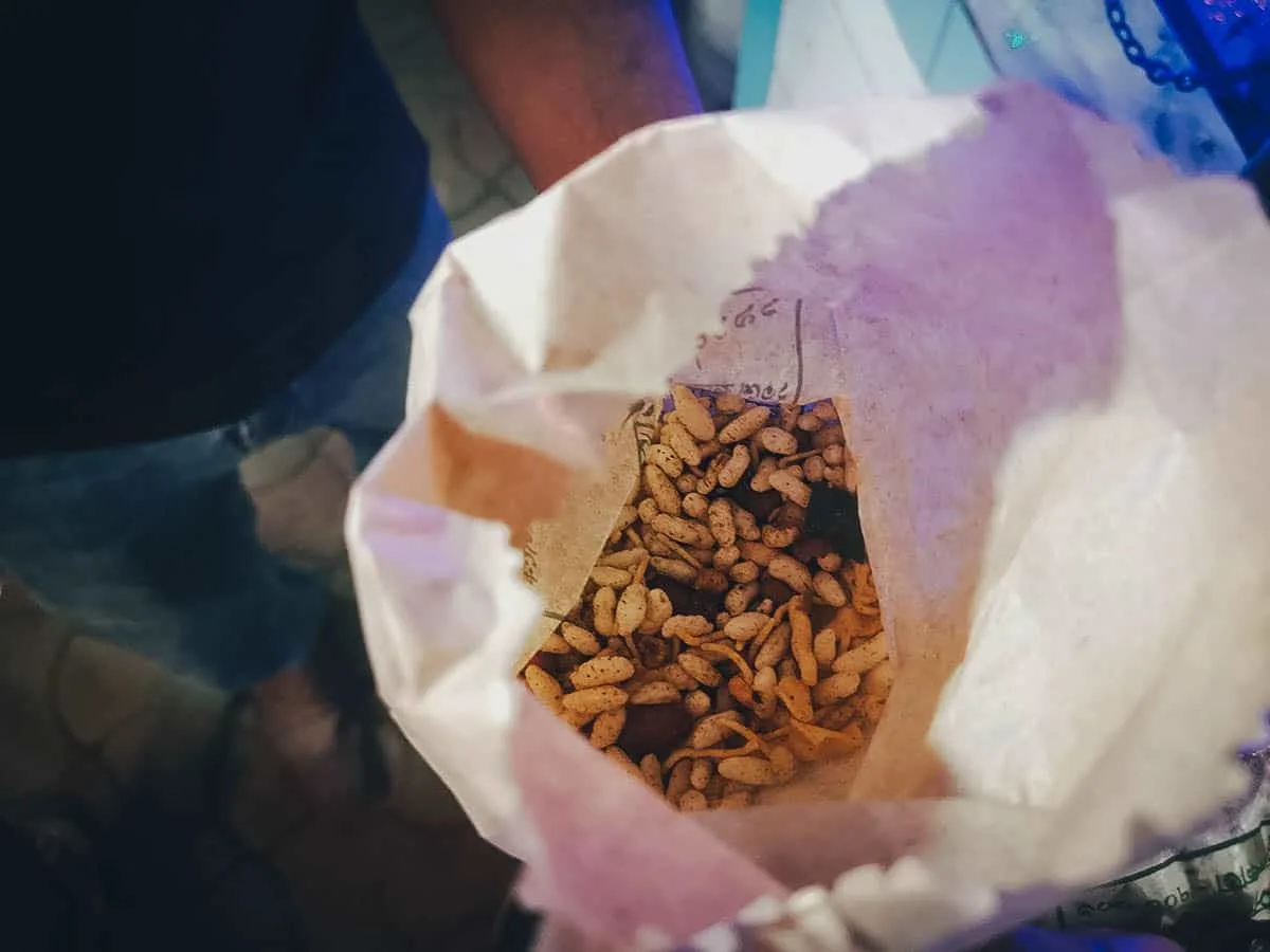 Indian Street Food Jhalmuri in a paper bag, one of the most popular street foods in Kolkata
