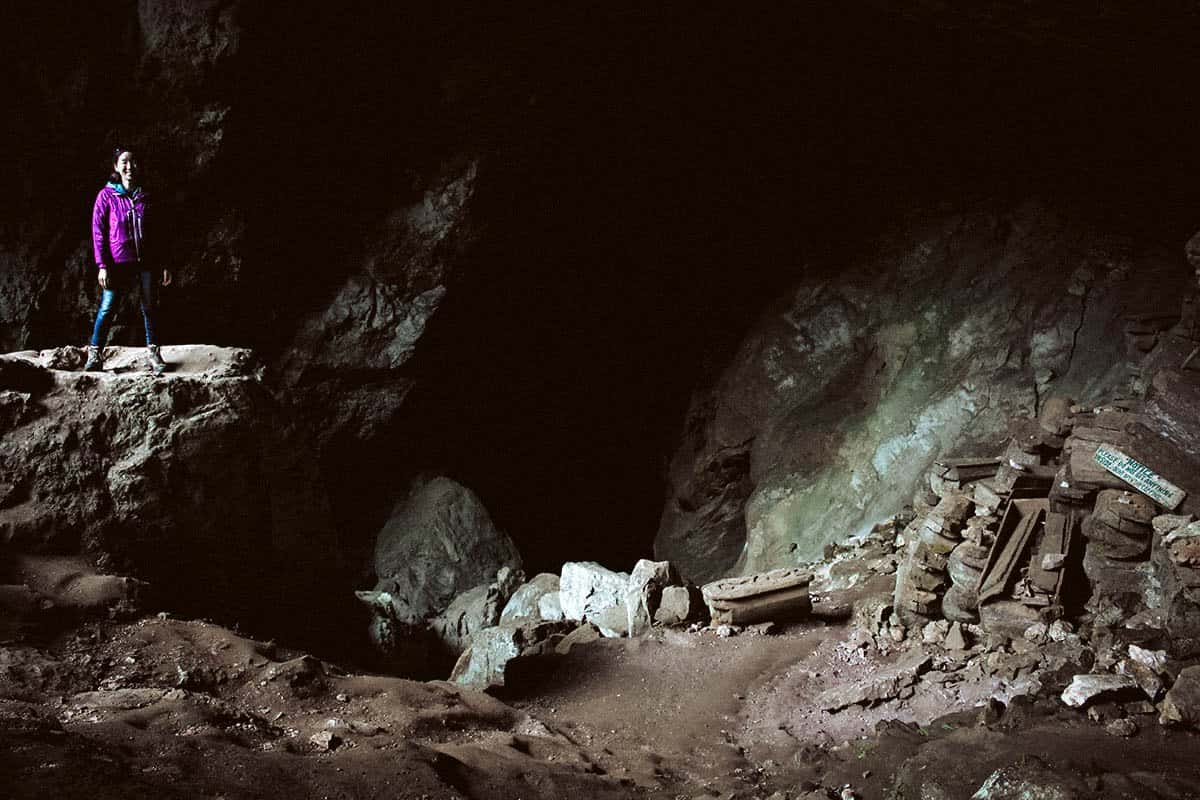 Kai standing inside Lumiang Burial Cave