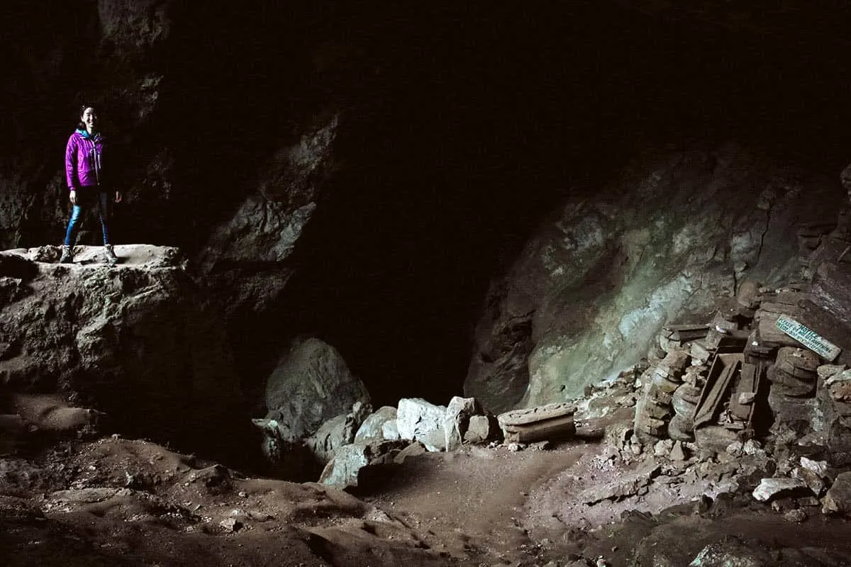 Kai standing inside Lumiang Burial Cave