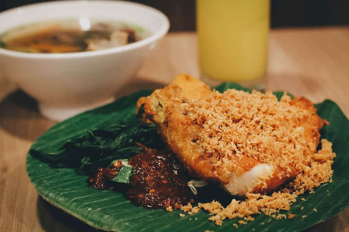 Plate of deep-fried smashed chicken