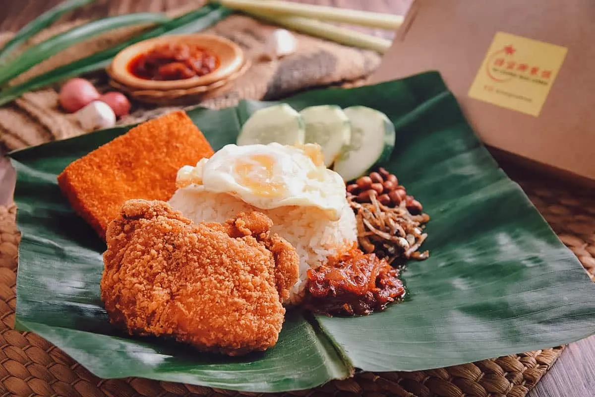 Fragrant coconut milk and pandan rice with deep-fried spicy thigh cutlet and chilli sauce