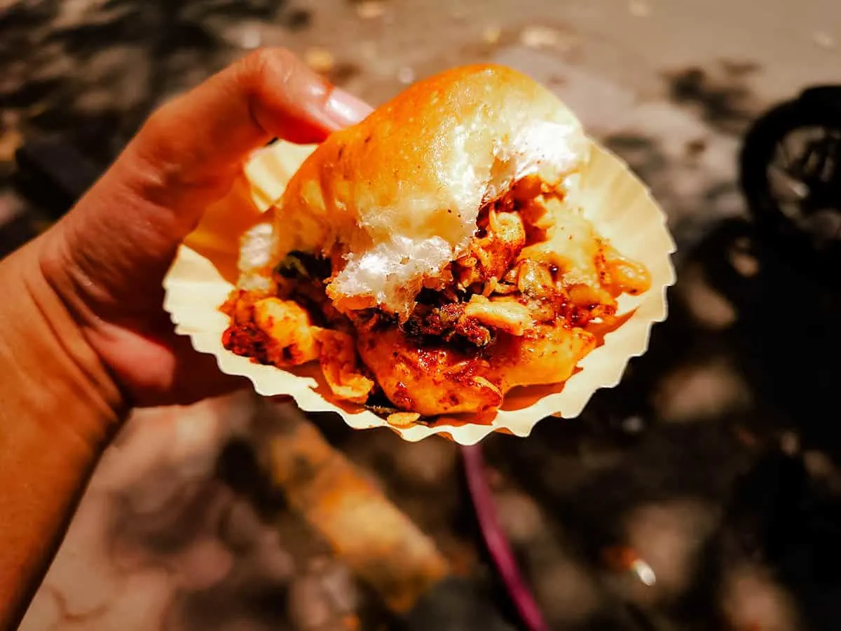 Vada pav with green chilies and garlic chutney, one of the most well-known street food dishes in Mumbai