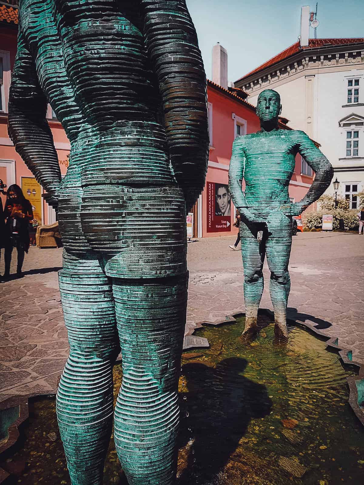Peeing sculptures at Kafka's museum