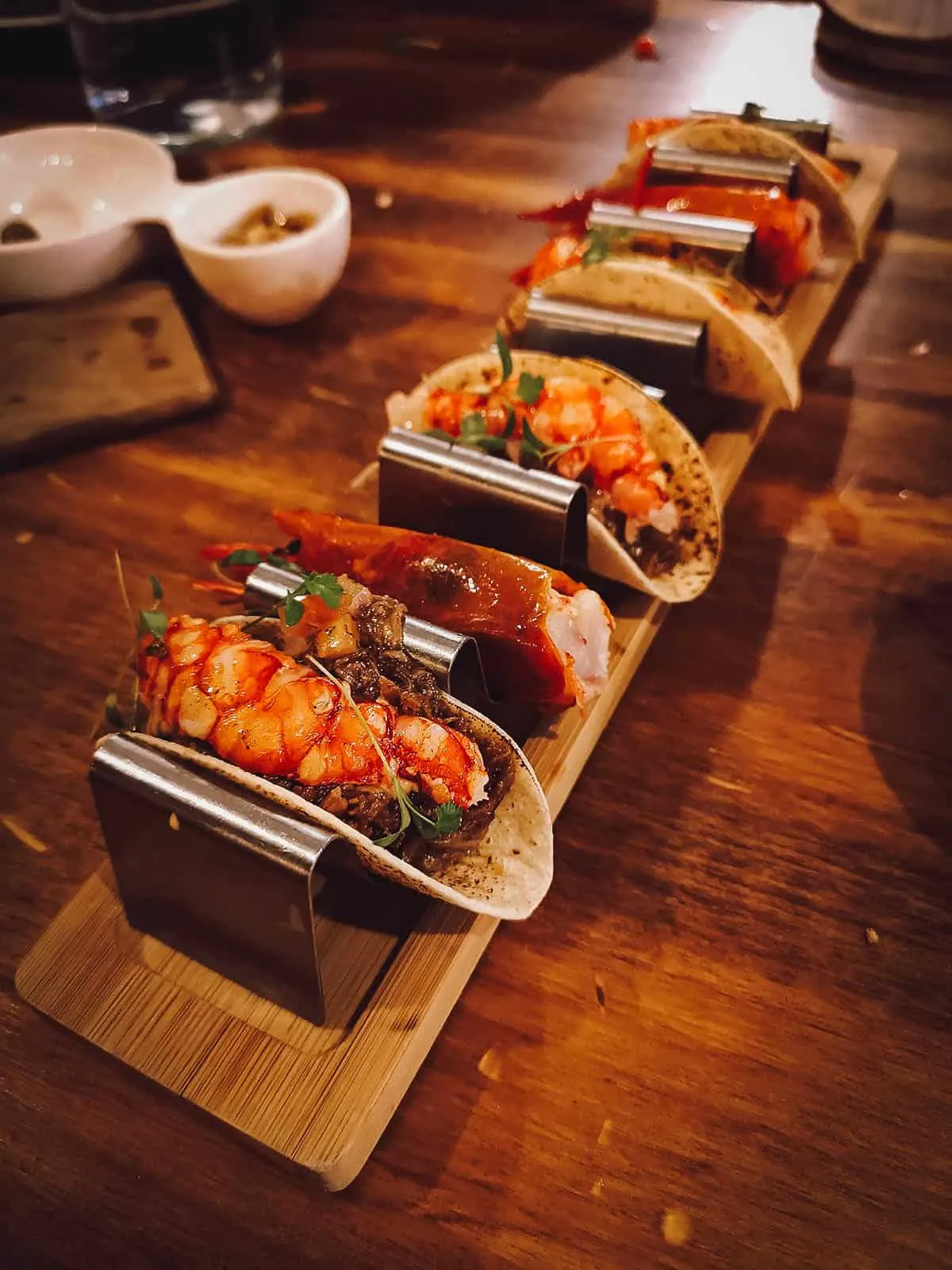 Madrid Food Guide: 14 Must-Try Restaurants, Bars, and Markets Pork cheek and red prawn tacos