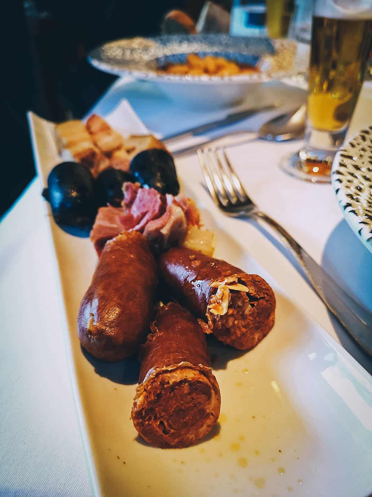 Different meats at La Corte de Pelayo restaurant in Oviedo, Spain