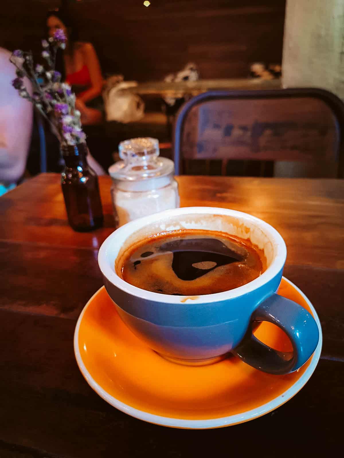 Cup of black coffee from a popular cafe in Bali