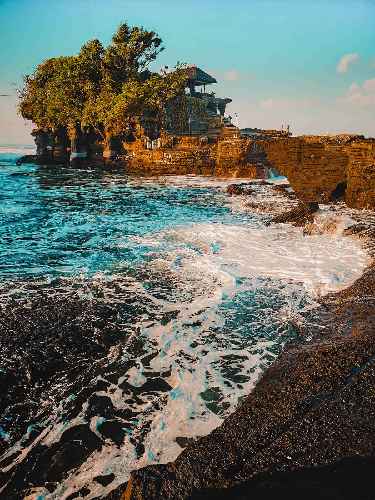 Travel Guide to Bali: Tanah Lot Templea against clear blue skies