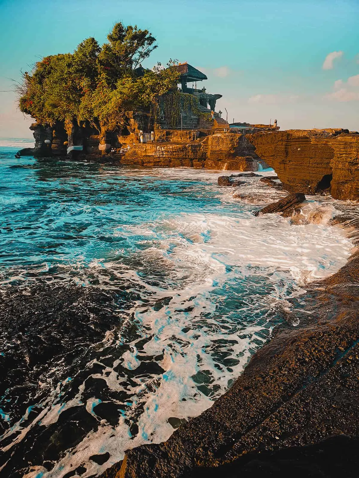 Tanah Lot Temple, Bali, Indonesia Travel Guide to Bali: Tanah Lot Templea against clear blue skies