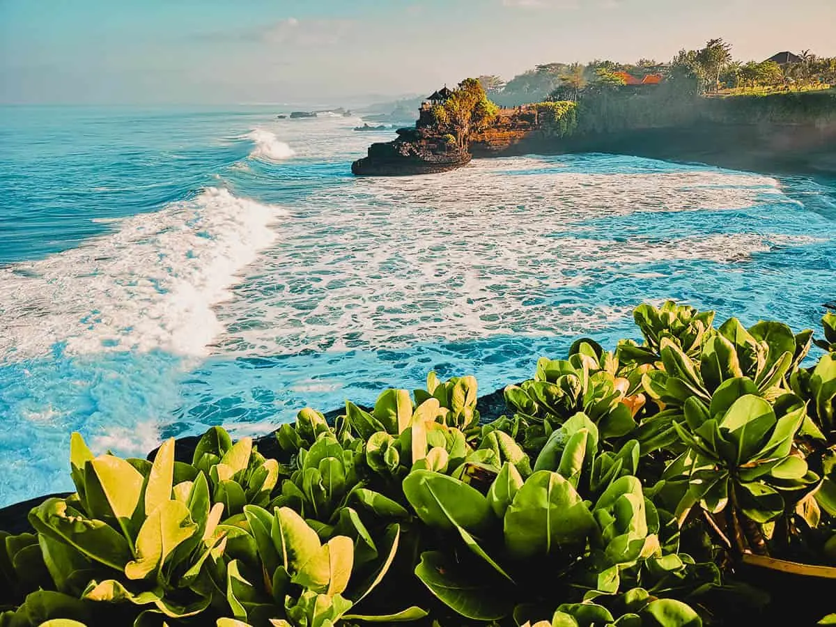 Travel Guide to Bali: Waves crashing at Tanah Lot Temple