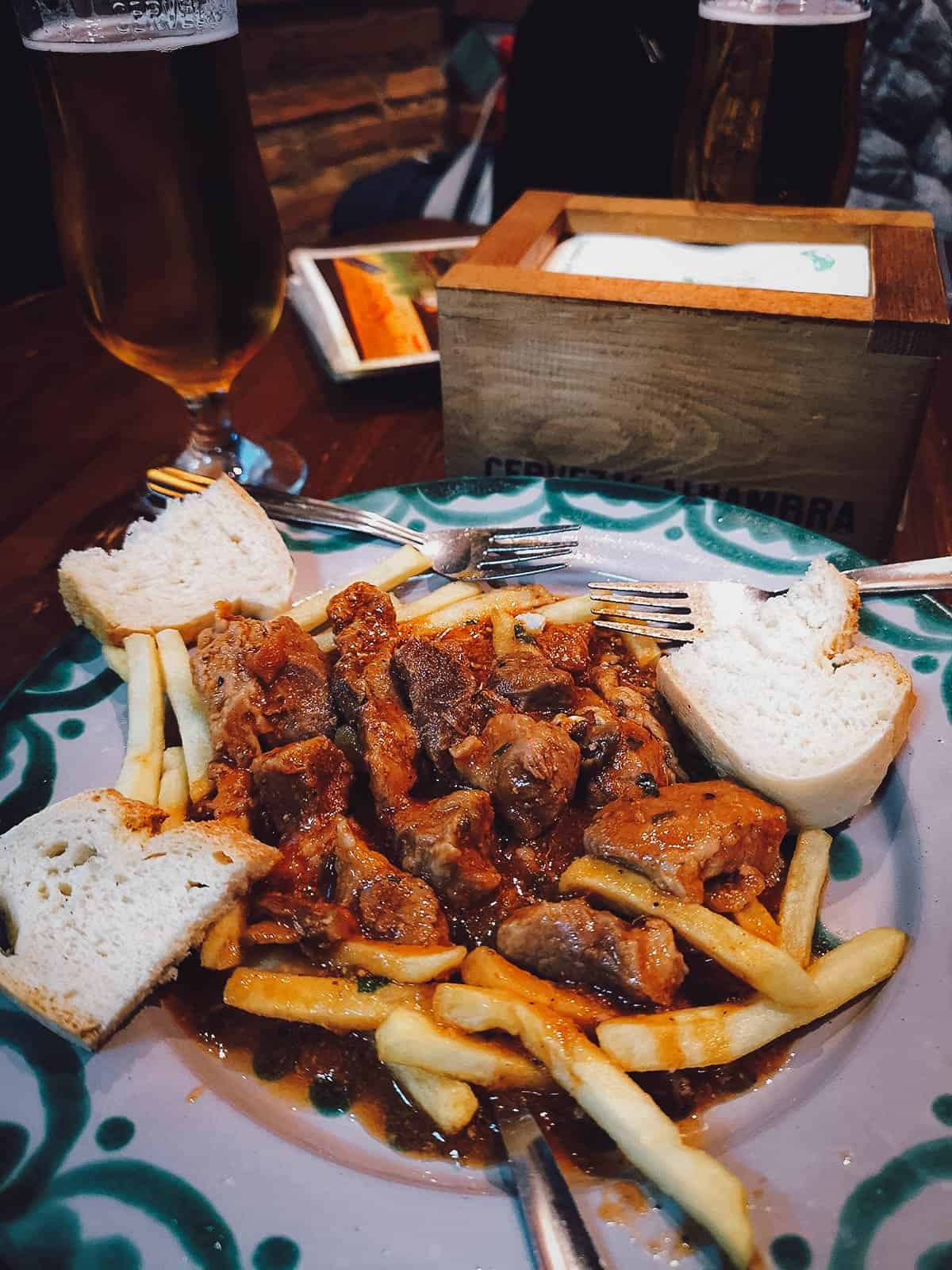 Plate of tapas at a bar in Granada, Spain