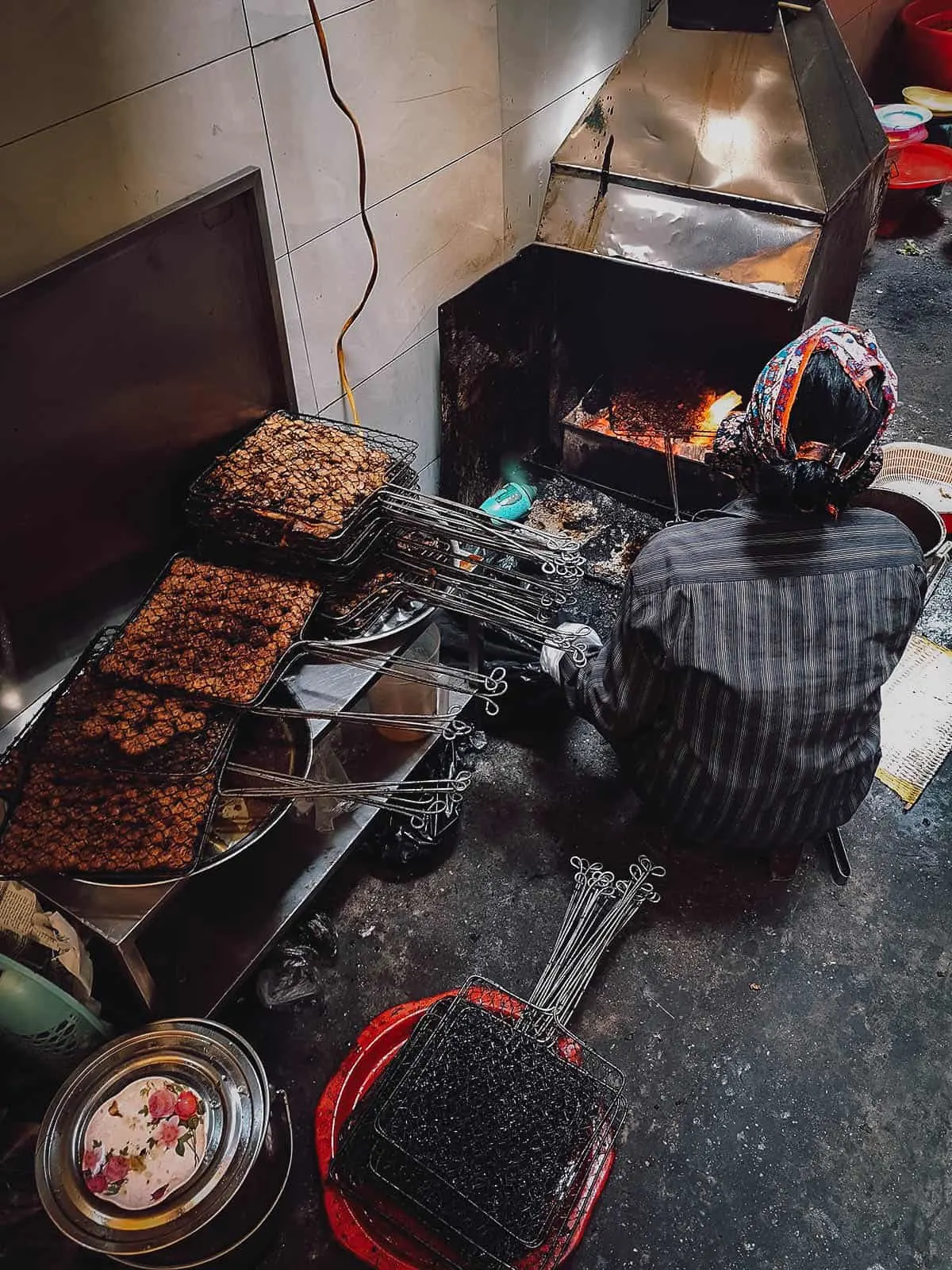 Grilling bun cha in Hanoi