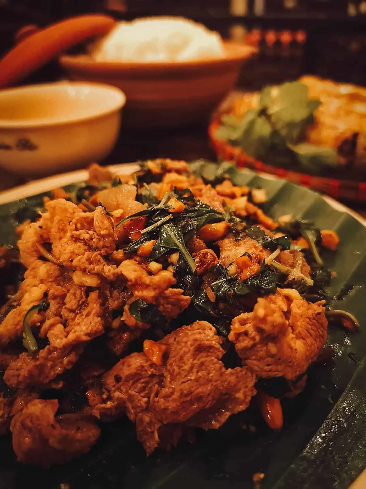 Duck with basil leaves at Chim Sao in Hanoi