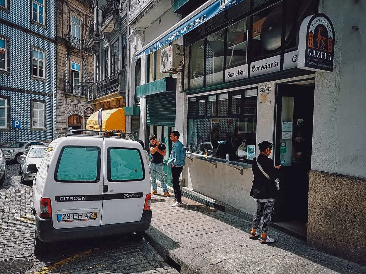 Porto Food Guide: 15 Must-Eat Restaurants in Porto, Portugal Frontage of Gazela Cachorrinhos da Batalha