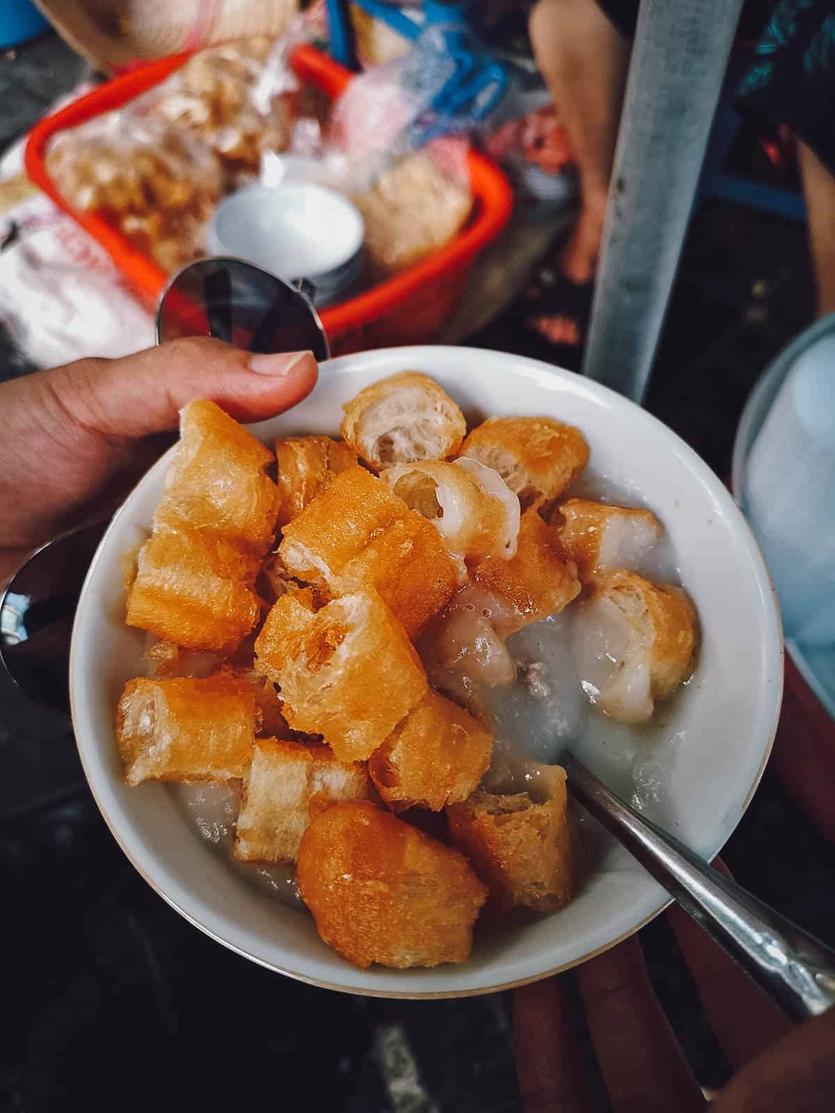 Chao Ga with crullers in Hanoi, a tasty Vietnamese chicken congee or porridge