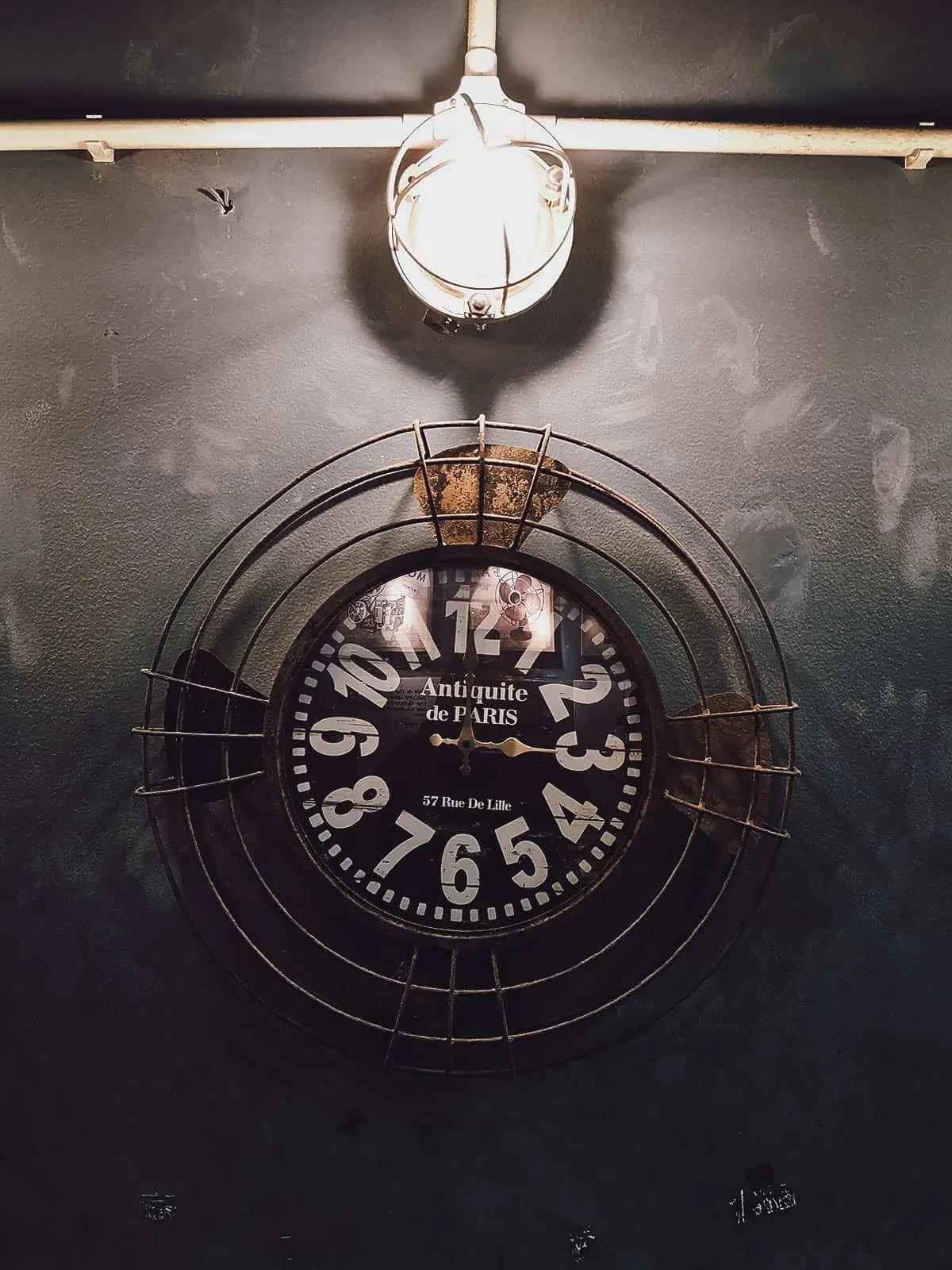 Instagrammable Cafes in Saigon, Vietnam Vintage wall clock at Saiigon Lão Quạ Coffee