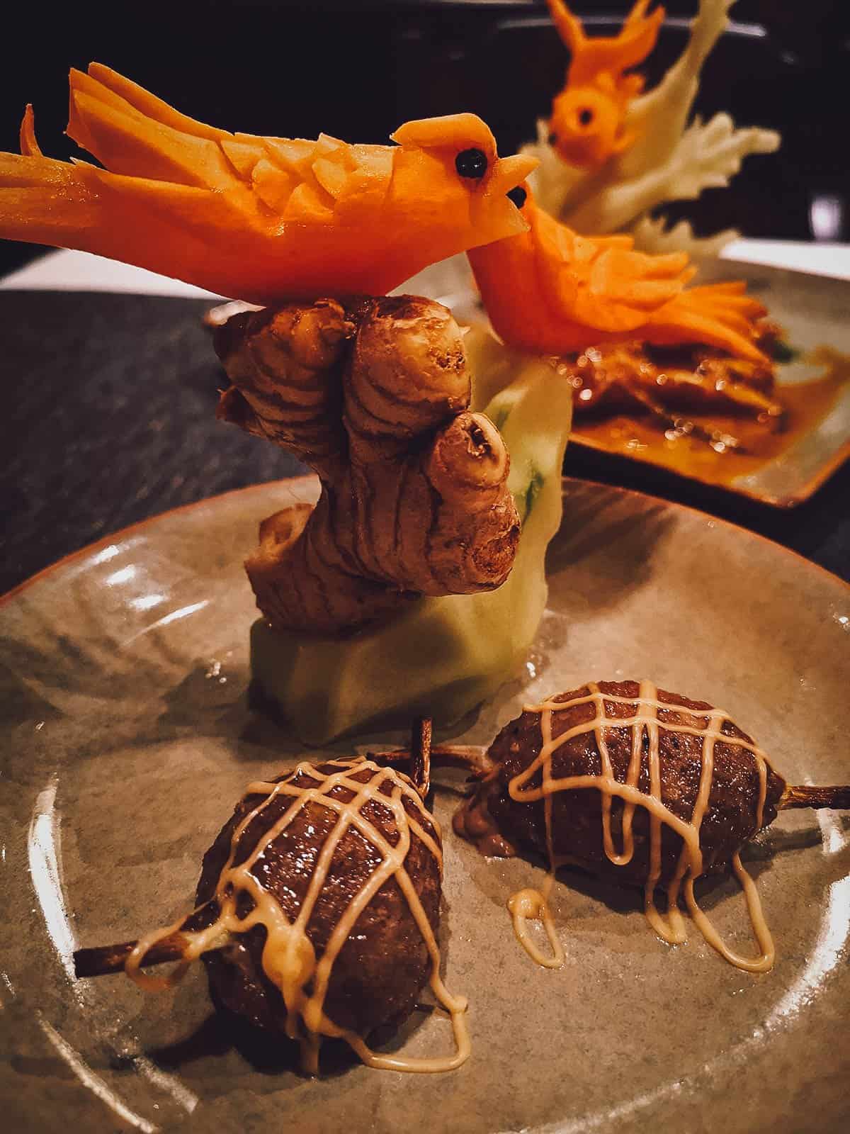 Grilled beef dish with hand-carved vegetables