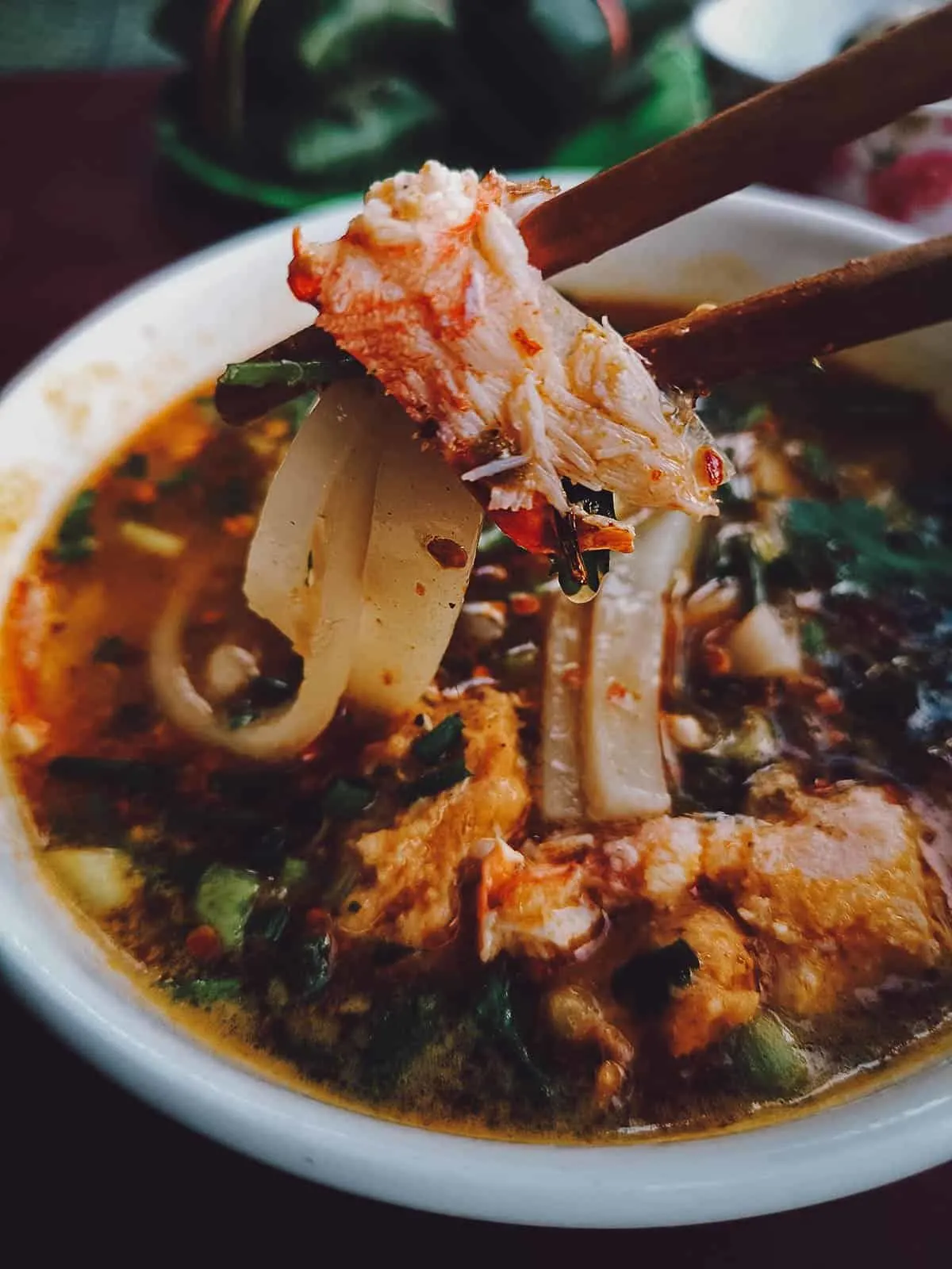 Banh canh in Hue, a tasty Vietnamese noodle soup made with thicker noodles