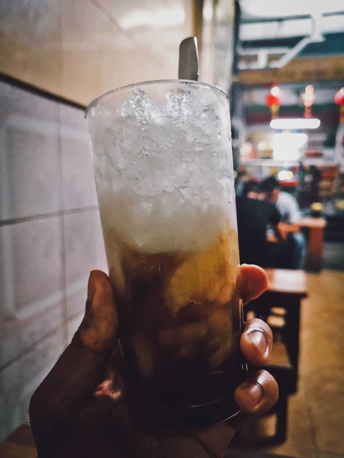 Glass of che at a restaurant in Hue, Vietnam