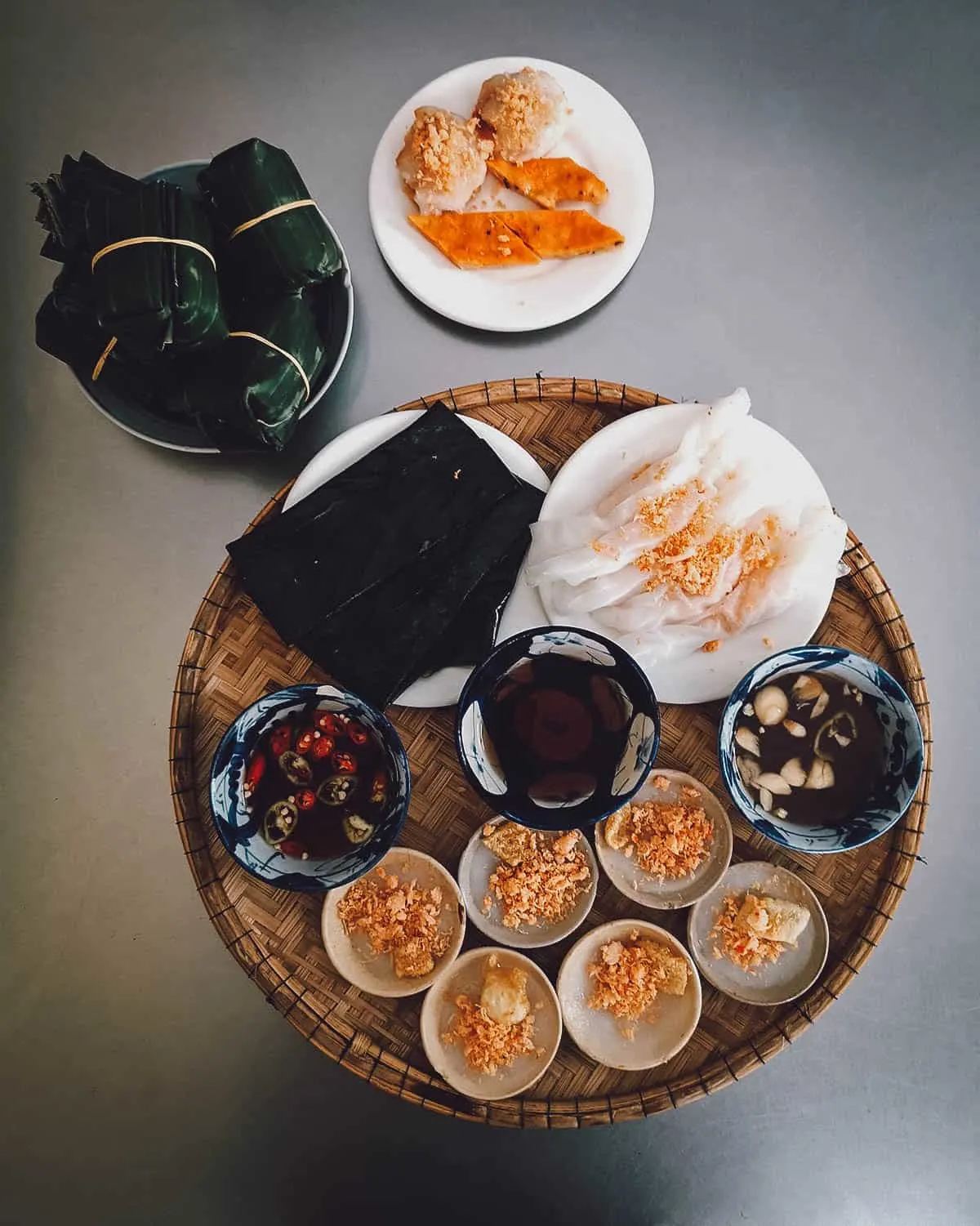 Steamed rice cakes and fish sauce at Hang Me Me restaurant in Hue, Vietnam